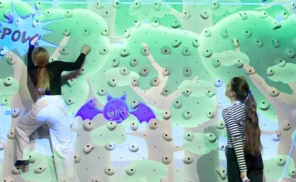  Children climbing the climbing wall